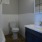 a bathroom with a toilet and sink