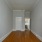 a hallway with white doors